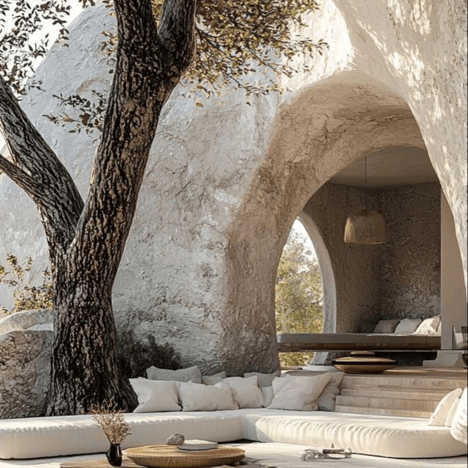 Villa troglodyte luxueuse avec salon sculpté dans la roche face à l'océan